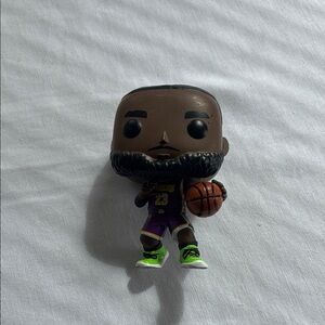 Funko Pop Figure with Brown and Green Accents